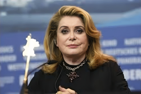 Darius Rochebin and Catherine Deneuve